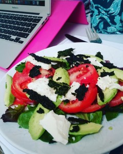 Leafy kale crisps scattered on salad