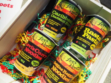 Close up of 4 flavours of LevI Roots snack pots