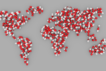 world map made out of red and white pills showing how much impact the opioid crisis is having on the world