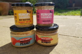 4 jars of Hungry Squirrel Nut butter stacked in pairs.