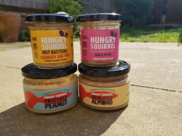 4 jars of Hungry Squirrel Nut butter stacked in pairs.