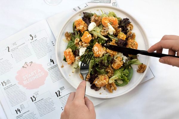 Plate of healthy food on top of a calendar suggesting healthy habits can easly be formed if planned correctly
