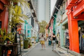 tourists wandering down a foreign street