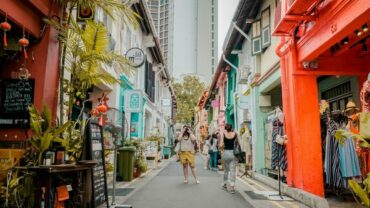 tourists wandering down a foreign street