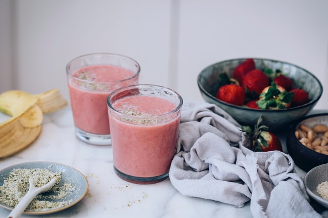 two nutritious smoothies in cute glass jars