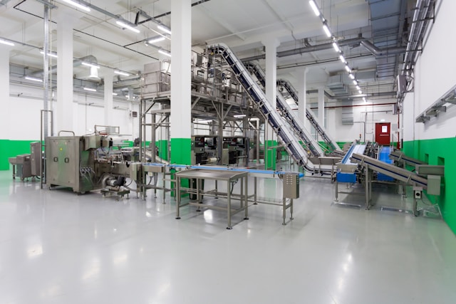 Capsules moving along a clean supplement manufacturing production line